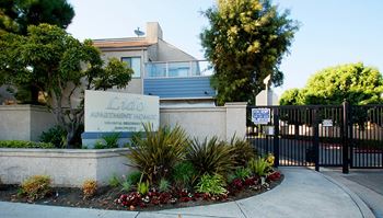 Traditional 1985 two story building with gated entry